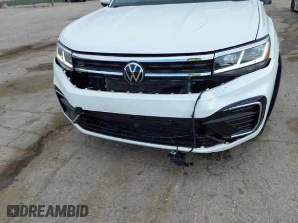 2023 Volkswagen Atlas SEL Premium R-Line z VIN 1V2FE2CA8PC221736, wystawiony jako IAAI lot #42155629 z przebiegiem 54 394 mil mil oraz . Historia ofert i sprzedaży dostępna na DreamBid. Obrazek 6.
