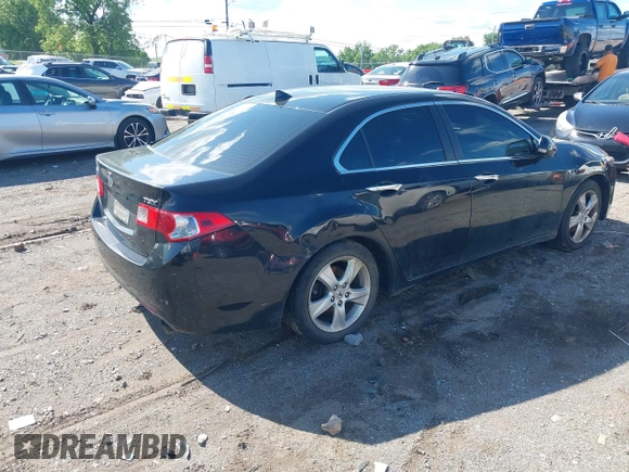 2009 Acura TSX with VIN JH4CU26659C011482, listed as a IAAI auction lot 42212079 with 243,119 mi miles. Bid and sale history available at carsss.com. Image 4.