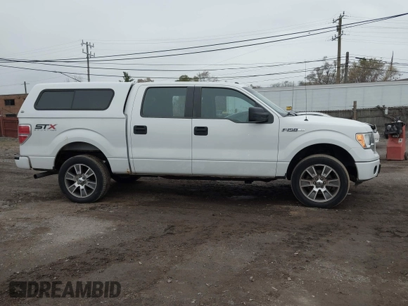 2014 Ford F-150 XL with VIN 1FTFW1EFXEFB08741, listed as a IAAI auction lot 40930645 with 138,394 mi miles and . Bid and sale history available at DreamBid. Image 13.