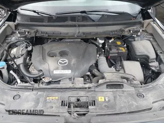 2023 Mazda CX-9 Touring Plus with VIN JM3TCBAY2P0657825, listed as a IAAI auction lot 42756562 with 52,090 mi miles and . Bid and sale history available at DreamBid. Image 10.
