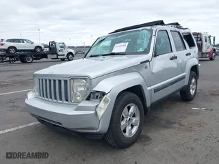 2012 Jeep Liberty Sport with VIN 1C4PJMAK1CW152938, listed as a IAAI auction lot 41745194 with 113,367 mi miles. Bid and sale history available at carsss.com. Image 2.