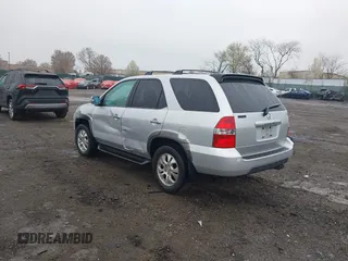 2003 Acura MDX Touring Pkg w/Navigation System with VIN 2HNYD18863H525646, listed as a IAAI auction lot 41951543 with 167,289 mi miles. Bid and sale history available at carsss.com. Image 3.