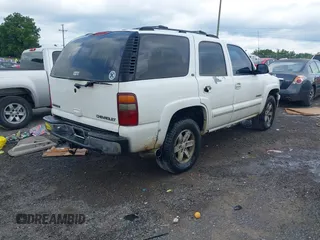 2002 Chevrolet Tahoe LS with VIN 1GNEK13Z22R143490, listed as a IAAI auction lot 42609711 with 323,388 mi miles and . Bid and sale history available at DreamBid. Image 4.