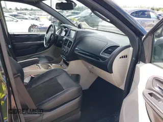 2019 Dodge Grand Caravan SXT with VIN 2C4RDGCG5KR797853, listed as a IAAI auction lot 40332854 with 81,197 mi miles and . Bid and sale history available at DreamBid. Image 5.
