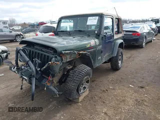 1997 Jeep Wrangler SE with VIN 1J4FY29PXVP406939, listed as a IAAI auction lot 41612380 with 248,314 mi miles. Bid and sale history available at carsss.com. Image 21.