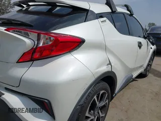 2019 Toyota C-HR XLE with VIN JTNKHMBX9K1054053, listed as a IAAI auction lot 42120256 with 67,083 mi miles and . Bid and sale history available at DreamBid. Image 18.