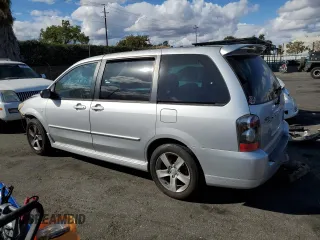 2005 Mazda MPV LX z VIN JM3LW28J450549591, wystawiony jako Copart lot #78304054 z przebiegiem 215 645 mil mil oraz Szkoda całkowita • Salvage title. Historia ofert i sprzedaży dostępna na DreamBid. Obrazek 2.