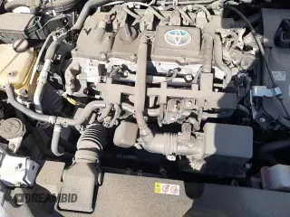 2020 Toyota Corolla Hybrid LE z VIN JTDEBRBEXLJ025709, wystawiony jako Copart lot #69036985 z przebiegiem 66 497 mil mil oraz Szkoda całkowita • Salvage title. Historia ofert i sprzedaży dostępna na DreamBid. Obrazek 13.