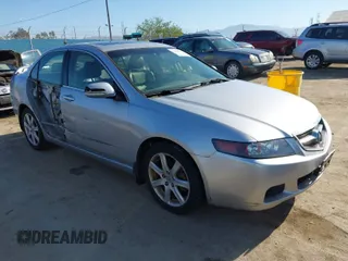 2004 Acura TSX w/Navigation with VIN JH4CL96944C002982, listed as a IAAI auction lot 41855710 with 165,129 mi miles. Bid and sale history available at carsss.com. Image 1.