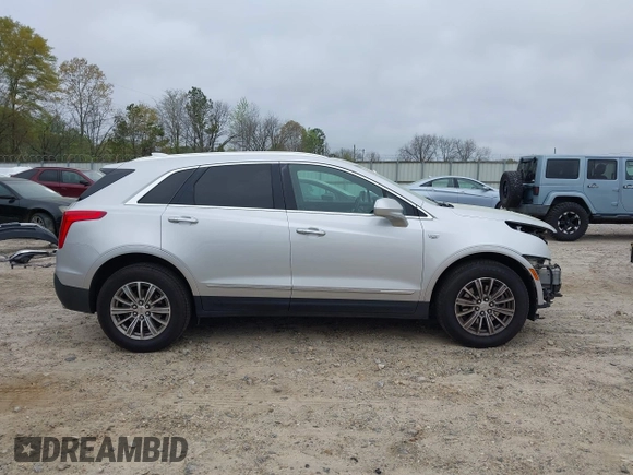 2017 Cadillac XT5 Luxury FWD z VIN 1GYKNBRS2HZ232241, wystawiony jako IAAI lot #41875766 z przebiegiem 195 113 mil mil oraz . Historia ofert i sprzedaży dostępna na DreamBid. Obrazek 14.