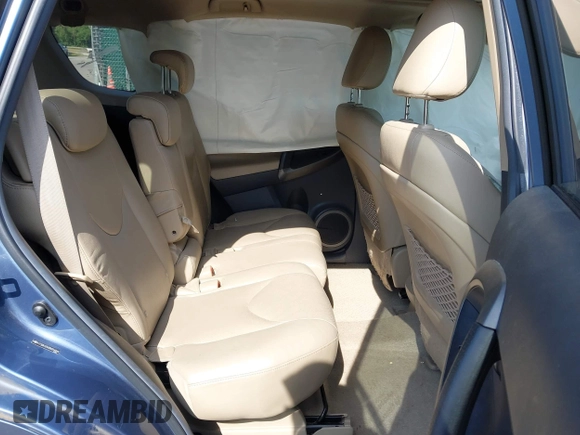 2011 Toyota RAV4 Ltd with VIN 2T3DK4DV6BW054846, listed as a IAAI auction lot 37560883 with 122,983 mi miles. Bid and sale history available at carsss.com. Image 8.