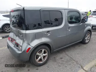 2010 Nissan Cube S z VIN JN8AZ2KR9AT153627, wystawiony jako IAAI lot #42352451 z przebiegiem 184 305 mil mil oraz . Historia ofert i sprzedaży dostępna na DreamBid. Obrazek 4.
