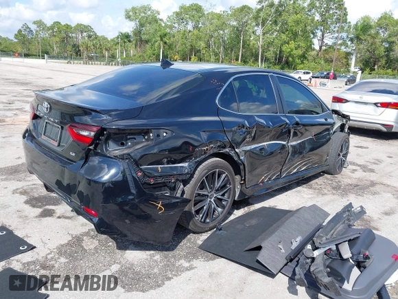 2023 Toyota Camry SE with VIN 4T1G11AK6PU741172, listed as a IAAI auction lot 41599909 with 56,668 mi miles and . Bid and sale history available at DreamBid. Image 4.