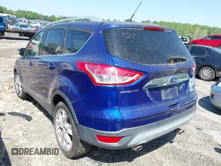 2014 Ford Escape Titanium with VIN 1FMCU0JX2EUB78596, listed as a IAAI auction lot 41994873 with 96,437 mi miles. Bid and sale history available at carsss.com. Image 3.