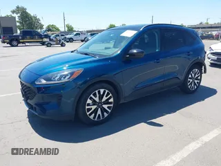 2020 Ford Escape SE Sport Hybrid with VIN 1FMCU0BZ1LUC15585, listed as a IAAI auction lot 42205354 with 21,044 mi miles and . Bid and sale history available at carsss.com. Image 2.
