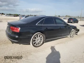2013 Audi A8 3.0L with VIN WAUAGAFDXDN032766, listed as a Copart auction lot 84275944 with 127,388 mi miles and Salvage title. Bid and sale history available at DreamBid. Image 3.