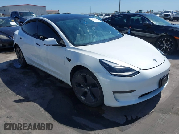 2023 Tesla Model 3 z VIN 5YJ3E1EA0PF608506, wystawiony jako IAAI lot #41748862 z przebiegiem 15 mil mil oraz . Historia ofert i sprzedaży dostępna na DreamBid. Obrazek 1.