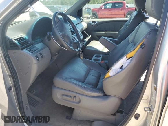 2009 Honda Odyssey EX-L с VIN 5FNRL38719B029023, выставлен на аукционе Copart как лот 58358715 с пробегом 158 949 миль миль и Чистый • Clean title. История ставок и продаж доступна на DreamBid. Изображение 7.