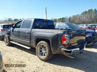 2014 Chevrolet Silverado 1500 LTZ with VIN 3GCUKSEC6EG420603, listed as a IAAI auction lot 41756902 with 112,929 mi miles and . Bid and sale history available at DreamBid. Image 3.