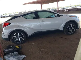 2022 Toyota C-HR XLE with VIN NMTKHMBX5NR147226, listed as a IAAI auction lot 42068867 with 21,863 mi miles. Bid and sale history available at carsss.com. Image 4.