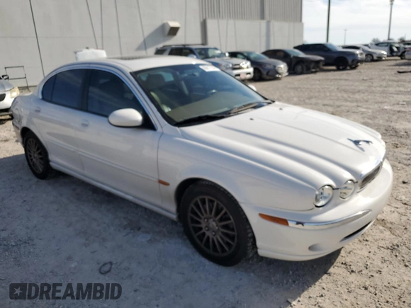2007 Jaguar X-Type z VIN SAJWA51A67WJ24665, wystawiony jako Copart lot #86817544 z przebiegiem 52 027 mil mil oraz Szkoda całkowita • Salvage title. Historia ofert i sprzedaży dostępna na DreamBid. Obrazek 4.