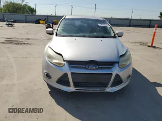 2012 Ford Focus SE z VIN 1FAHP3F23CL174243, wystawiony jako Copart lot #52247595 z przebiegiem 164 383 mil mil oraz Czysty tytuł • Clean title. Historia ofert i sprzedaży dostępna na DreamBid. Obrazek 5.