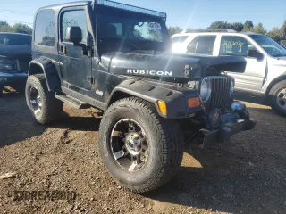 2004 Jeep Wrangler Rubicon with VIN 1J4FA69S44P734355, listed as a Copart auction lot 72381334 with 113,024 mi miles and Salvage Title. Bid and sale history available at carsss.com. Image 4.