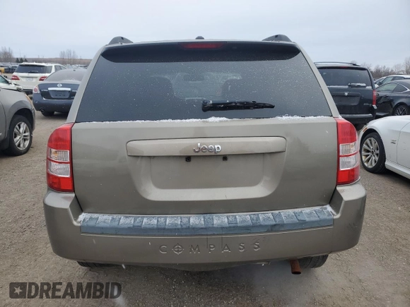 2008 Jeep Compass Sport with VIN 1J8FT47WX8D566487, listed as a Copart auction lot 87428694 with 377,985 mi miles and Salvage Title. Bid and sale history available at carsss.com. Image 6.