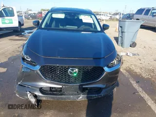 2022 Mazda CX-30 S Premium with VIN 3MVDMBDL0NM413867, listed as a IAAI auction lot 42082560 with 12,375 mi miles and . Bid and sale history available at DreamBid. Image 12.