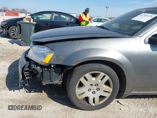 2013 Dodge Avenger SE with VIN 1C3CDZAB8DN596915, listed as a IAAI auction lot 41781939 with 122,440 mi miles and . Bid and sale history available at carsss.com. Image 12.