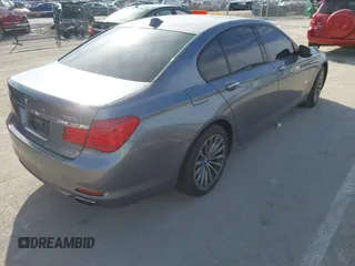 2009 BMW 7 Series 750i with VIN WBAKA83599CY34420, listed as a IAAI auction lot 41448738 with 105,141 mi miles. Bid and sale history available at carsss.com. Image 4.