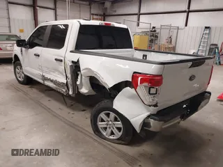 2021 Ford F-150 XL with VIN 1FTEW1C57MFA71572, listed as a IAAI auction lot 41549588 with 82,389 mi miles and . Bid and sale history available at carsss.com. Image 3.
