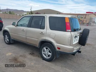 2000 Honda CR-V SE with VIN JHLRD1874YC046995, listed as a IAAI auction lot 42033059 with 218,484 mi miles. Bid and sale history available at carsss.com. Image 3.