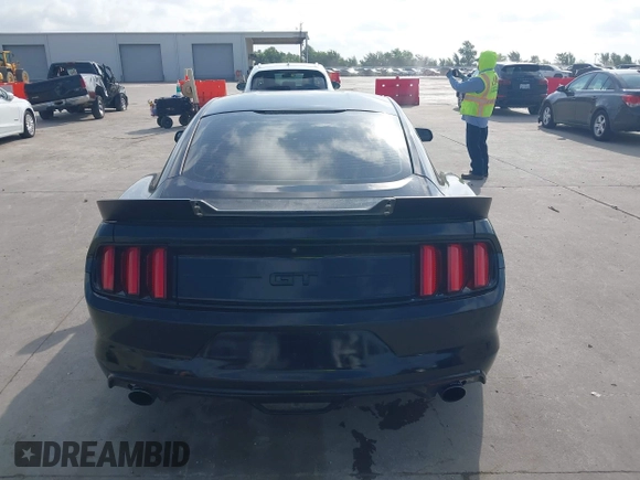 2015 Ford Mustang EcoBoost with VIN 1FA6P8TH3F5418205, listed as a IAAI auction lot 42552784 with 124,782 mi miles and . Bid and sale history available at DreamBid. Image 16.