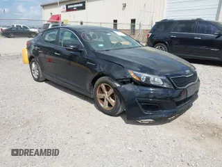 2015 Kia Optima LX with VIN 5XXGM4A77FG487033, listed as a IAAI auction lot 41974724 with 173,451 mi miles. Bid and sale history available at carsss.com. Image 1.