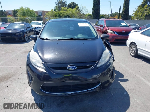 2011 Ford Fiesta SES with VIN 3FADP4FJ9BM181965, listed as a IAAI auction lot 42092140 with 150,304 mi miles. Bid and sale history available at carsss.com. Image 13.
