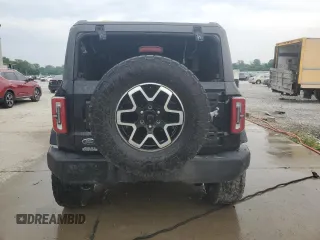 2023 Ford Bronco z VIN 1FMEE5DP3PLB59482, wystawiony jako Copart lot #59725815 z przebiegiem 54 741 mil mil oraz Szkoda całkowita • Salvage title. Historia ofert i sprzedaży dostępna na DreamBid. Obrazek 6.