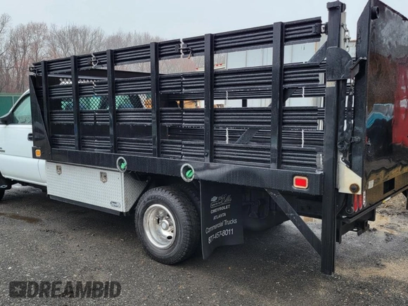 2007 Chevrolet Silverado 1500 with VIN 1GBJC34D67E167779, listed as a Copart auction lot 52091775 with 166,218 mi miles and Clean Title. Bid and sale history available at DreamBid. Image 2.