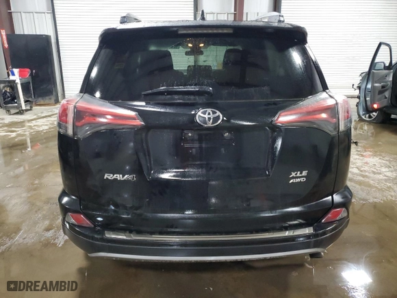 2018 Toyota RAV4 XLE with VIN 2T3RFREV3JW833223, listed as a Copart auction lot 52891285 with 93,122 mi miles and Salvage Title. Bid and sale history available at carsss.com. Image 6.