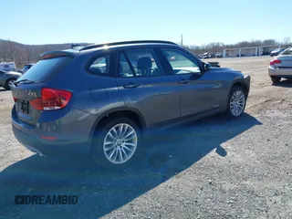 2015 BMW X1 xDrive28i with VIN WBAVL1C59FVY25442, listed as a IAAI auction lot 41854794 with 98,432 mi miles. Bid and sale history available at carsss.com. Image 4.