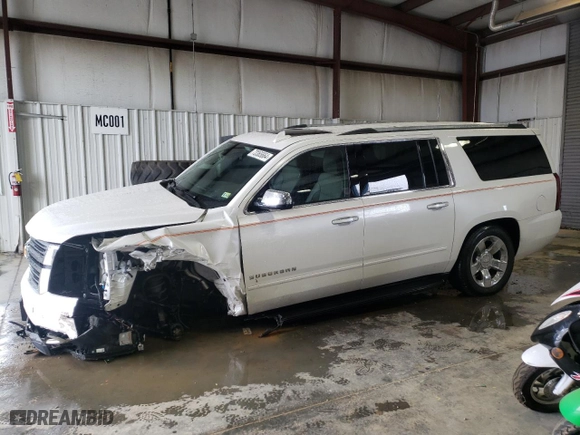 2020 Chevrolet Suburban Premier with VIN 1GNSKJKC5LR174248, listed as a Copart auction lot 73365664 with 124,755 mi miles and Salvage Title. Bid and sale history available at carsss.com. Image 1.