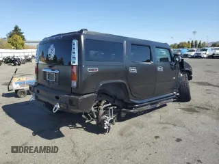2003 Hummer H2 with VIN 5GRGN23U83H134284, listed as a Copart auction lot 70259154 with 0 mi miles and Salvage Title. Bid and sale history available at carsss.com. Image 3.