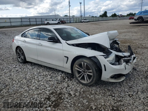 2015 BMW 4 Series 428i xDrive with VIN WBA4A7C53FD415066, listed as a Copart auction lot 61880545 with 130,874 mi miles and Salvage title. Bid and sale history available at DreamBid. Image 4.