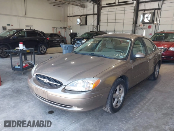 2003 Ford Taurus SE Standard with VIN 1FAFP53U13G229161, listed as a IAAI auction lot 39753697 with 94,195 mi miles. Bid and sale history available at carsss.com. Image 2.