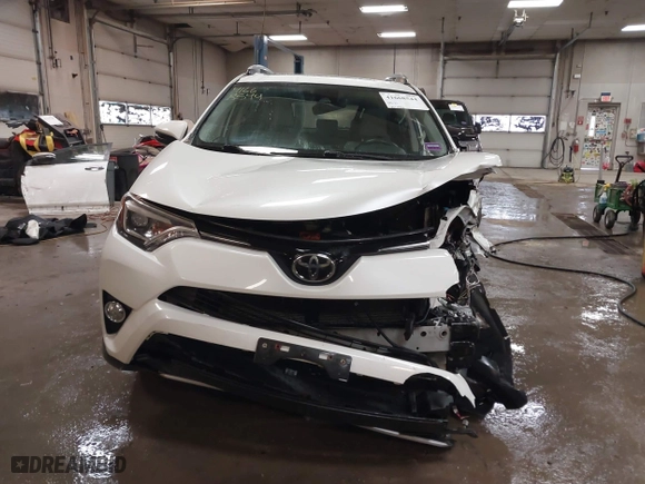 2018 Toyota RAV4 Limited with VIN JTMDFREV6JJ186499, listed as a IAAI auction lot 41668544 with 130,336 mi miles. Bid and sale history available at carsss.com. Image 13.