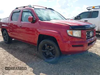 2006 Honda Ridgeline RTL z VIN 2HJYK16526H522943, wystawiony jako IAAI lot #42223234 z przebiegiem 227 758 mil mil oraz . Historia ofert i sprzedaży dostępna na DreamBid. Obrazek 1.