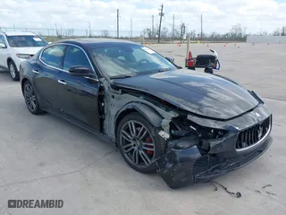2017 Maserati Ghibli with VIN ZAM57XSA6H1218753, listed as a IAAI auction lot 41833235 with 42,135 mi miles. Bid and sale history available at carsss.com. Image 1.