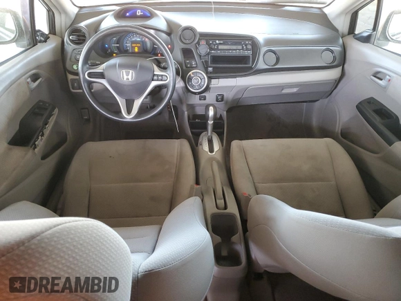 2013 Honda Insight with VIN JHMZE2H3XDS003838, listed as a Copart auction lot 52220235 with 144,729 mi miles and Salvage title. Bid and sale history available at DreamBid. Image 8.