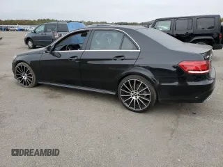 2014 Mercedes-Benz E 400 Sport with VIN WDDHF9FB4EA909283, listed as a Copart auction lot 73703584 with 73,857 mi miles and Salvage Title. Bid and sale history available at DreamBid. Image 2.