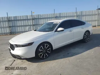 2024 Honda Accord Touring with VIN 1HGCY2F88RA001663, listed as a Copart auction lot 59710665 with 14,462 mi miles and Salvage title. Bid and sale history available at DreamBid. Image 1.